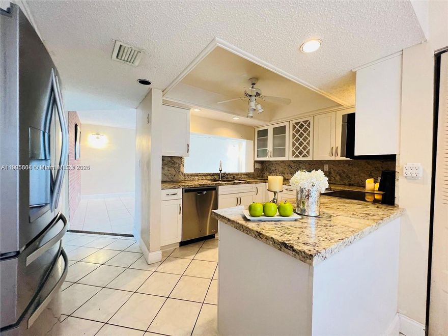 RIGHTLY PRICED..FRESHLY PAINTED.. UPDATED 3 HUGE BEDS/2 BATHS.
RESORT STYLE GOLF COMMUNITY,UPGRADED KITCHEN/WASHER DRYER INSIDE UNIT.BEST LOCATION IN DAVIE..Absolutely beautifully remodeled 3 bedroom/2 bath condo located in highly desirable SABAL PALM community.This unit features remodeled open kitchen w/granite countertops, stainless steel appliances, coffee bar plus ample cabinets & counter space.Open living space which leads to tiled & screened patio offering beautiful views... Large master bedroom featuring walk-in closet. Tile & Laminate flooring throughout (no carpet).No popcorn ceilings.Cable & Water included w/maintenance.Great community offering golf, tennis, pickleball, 4 community pools, 2 restaurants, 2 ballrooms, basketball & more.