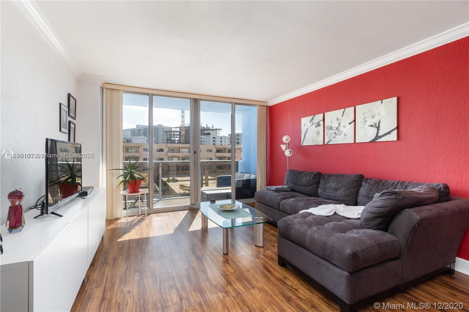 Beautiful tastefully furnished turn key ready 1/1 at 401 BLU! This spacious unit is 905 sq ft and comes fully equipped with everything you need! Some of the features include stainless steel appliances, wood floors throughout, high ceilings w/ crown moldings, huge walk in closets, hurricane impact windows, and a large private balcony with south exposure that floods the apartment with natural light. Amenities include 24/7 front desk, gym, covered secured parking, bike room, and a roof top pool with 360 views. Located in the heart of North Beach's Town Center with Publix, dining , shopping, entertainment, and your beach entrance all just steps away! With a walking score of 95 it's a perfect neighborhood for someone with an active lifestyle! A/C and hot water are included.