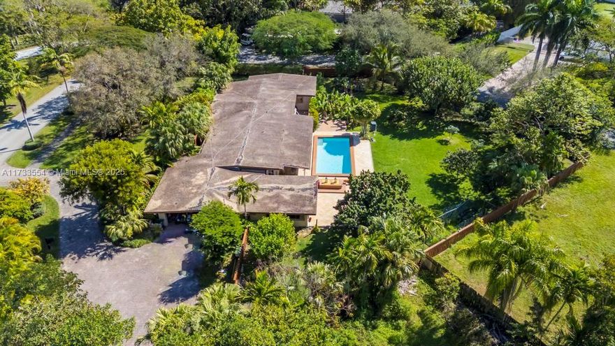 This expansive 30,056 sq ft corner lot offers endless potential for renovation or redevelopment. Surrounded by multi-million-dollar estates and luxury new construction, this property is a prime investment opportunity for developers or visionary homeowners looking to create a custom residence. While this large 4 bed, 4 bath pool home is in need of remodeling, the value lies in the land - ample space to build a grand estate. With Pinecrest’s continued growth and desirability, opportunities like this are increasingly rare.
Located near top-rated schools, world-class shopping, fine dining, and major highways, this property blends exclusivity with convenience. Whether you choose to renovate or build new, this is your chance to secure a place in one of Miami’s most prestigious neighborhoods.