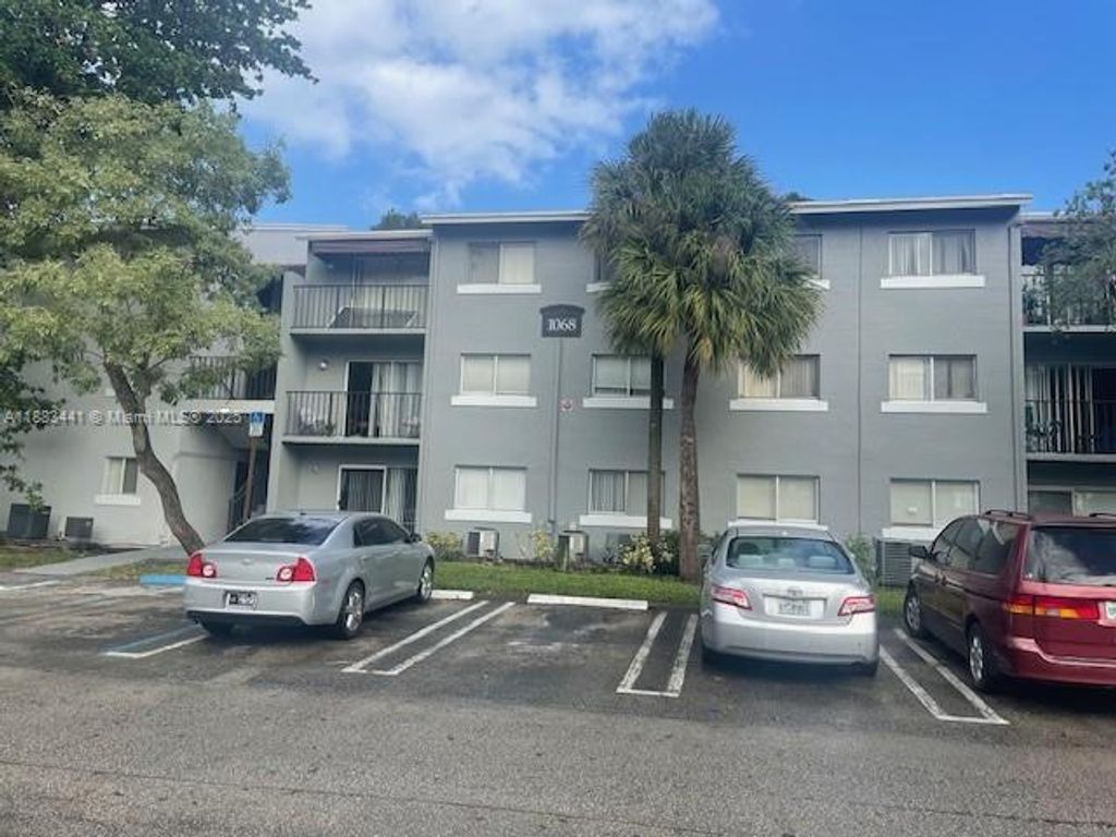 Photo of 1068 N Benoist Farms Rd #105, West Palm Beach, FL 33411 (MLS # A11883441)