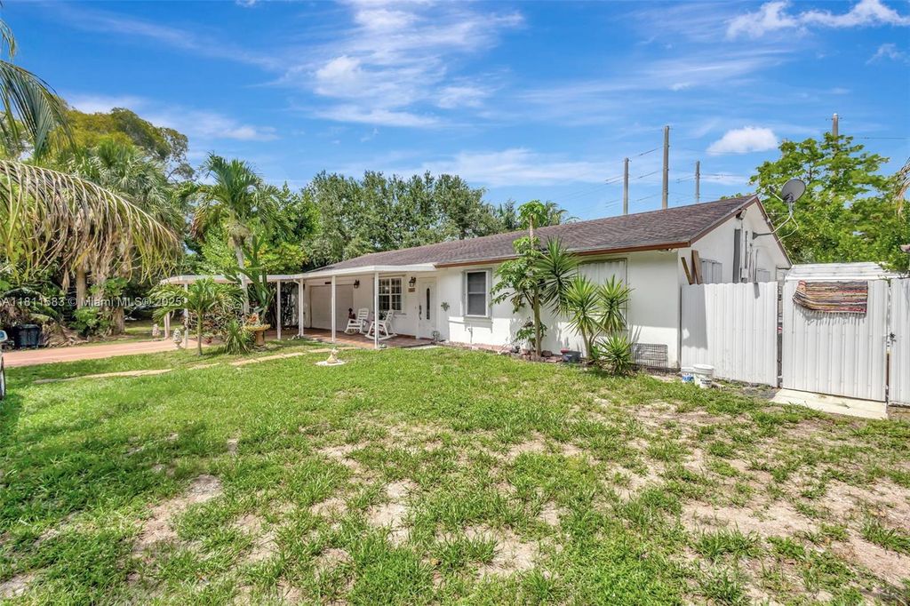 Photo of 4035 N 110th Ave N, West Palm Beach, FL 33411 (MLS # A11811583)