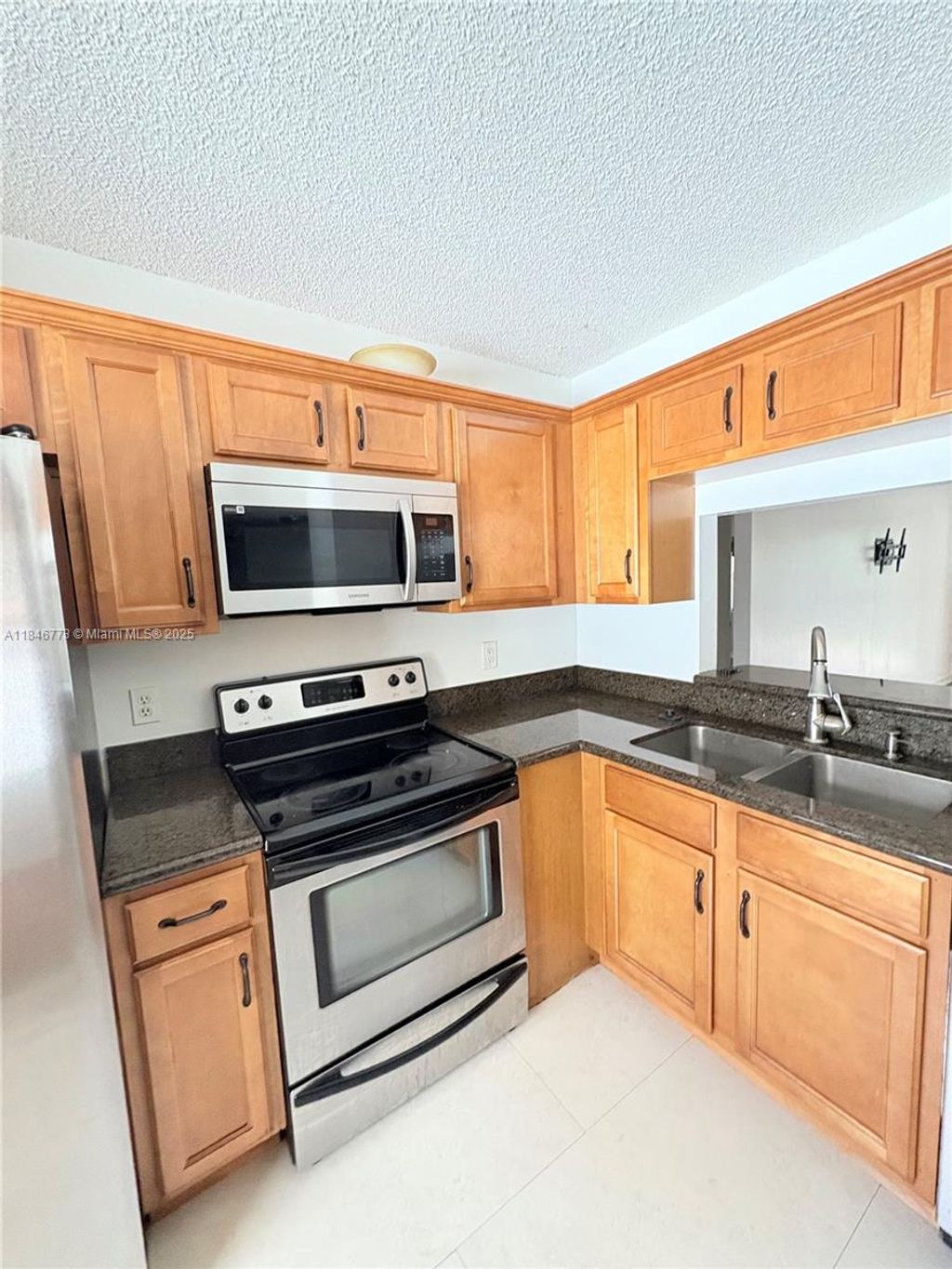 Photo of 11174 W Sample Rd #11174, Coral Springs, FL 33065 (MLS # A11846773)