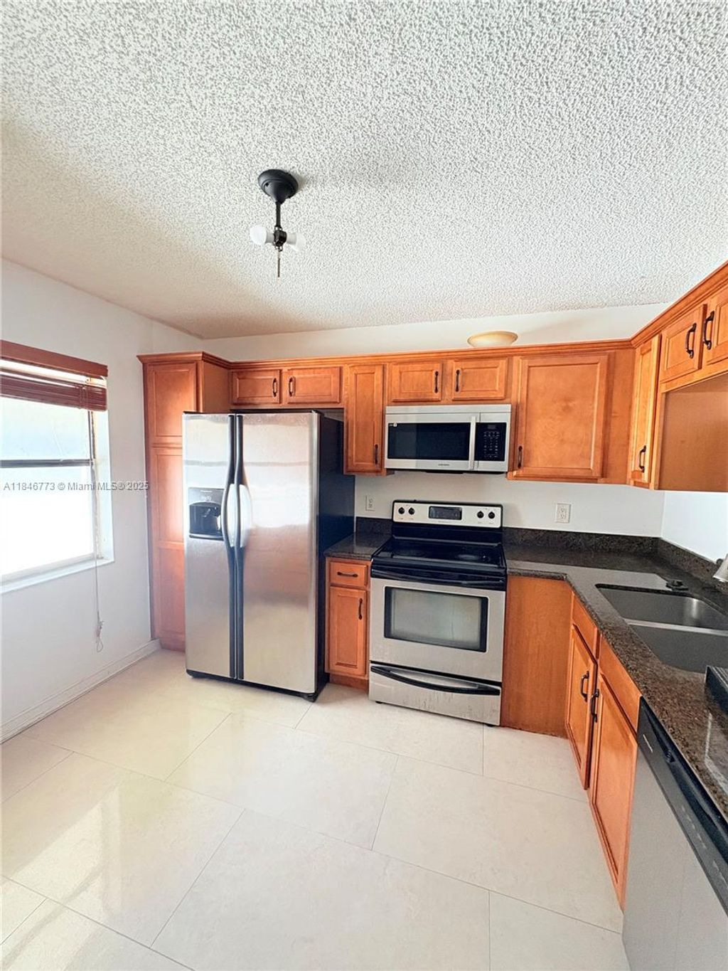 Photo of 11174 W Sample Rd #11174, Coral Springs, FL 33065 (MLS # A11846773)