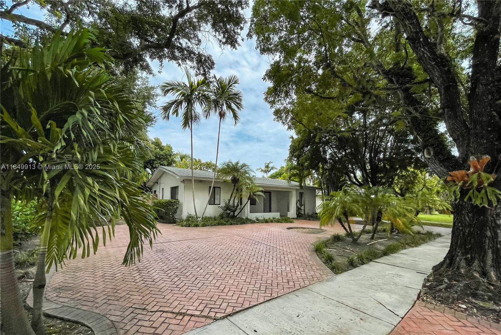 This inviting 3-bedroom, 2-bath home is located on a lovely street in South Miami. The interior is filled with natural light, creating a bright and comfortable living space. The home also features impact windows and doors. Step outside to a nice backyard, perfect for relaxing or entertaining, complete with a refreshing pool and plenty of green space. Yard and pool maintenance are included.Conveniently located with easy access to US1, Coral Gables, great shopping, and top local restaurants, this home offers the best of South Miami living.