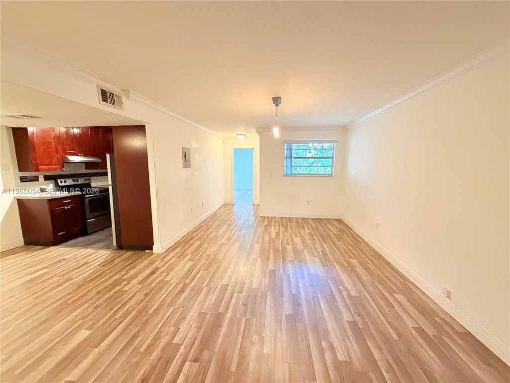 Photo of 11101 Royal Palm Blvd #204, Coral Springs, FL 33065 (MLS # A11965054)