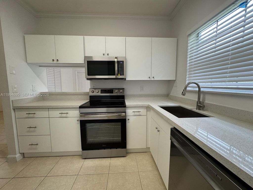 Photo of 1761 96th Te Ter #3O, Pembroke Pines, FL 33024 (MLS # A11994695)