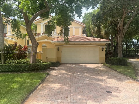 Photo of 1659 Passion Vine Cir #18-4, Weston, FL 33326 (MLS # A11950190)