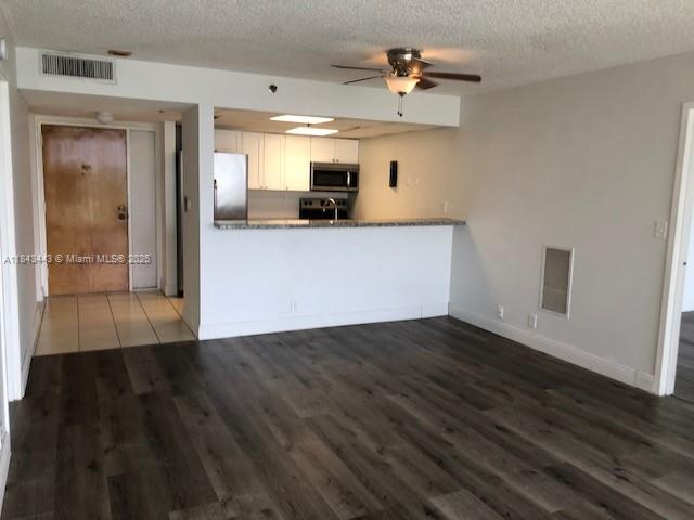 Two bed, two bad unit in Grandview Palace. Granite counter tops, wood kitchen cabinets, stainless steel appliances, washer & dryer in unit. PVC floors throughout (water resistant), lots of closet and living space. Big balcony with partial bay views. Attended lobby, remodeled pool area, management on-site, very well maintained building. 1 assigned parking space & guest parking available. No pets allowed. See association application for requirements.
