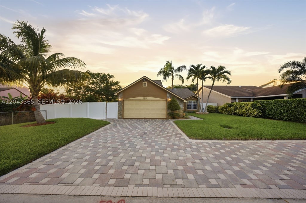 Photo of 7919 NW 50th St, Lauderhill, FL 33351 (MLS # A12043365)