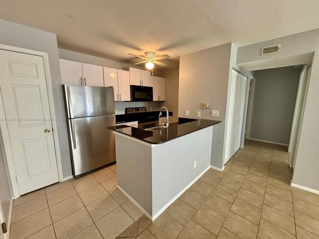 Photo of 1845 Palm Cove Blvd #8-102, Delray Beach, FL 33445 (MLS # A11837188)