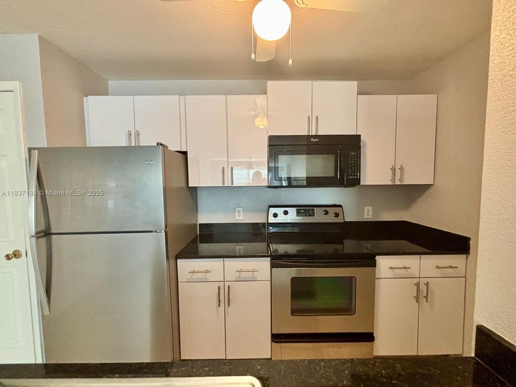 Photo of 1845 Palm Cove Blvd #8-102, Delray Beach, FL 33445 (MLS # A11837188)