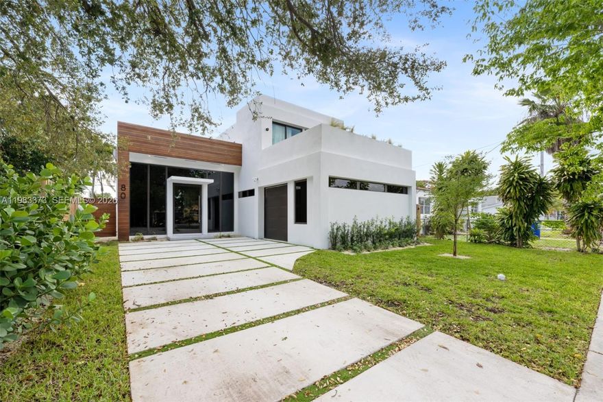 Located just a few blocks from the Miami Design District, this home spans 3,642 Total SQ/FT, featuring a sleek black kitchen with state of the art appliances, 13' ceilings, and spacious living areas. The outdoor space is perfect for entertaining, with a pool, patio, and BBQ area. All within a prime location few blocks from the Design District mall, 2 miles from Wynwood, and 10 minutes from Miami Beach. This home exemplifies the quality and lifestyle of the new developments nearby. Reach out to schedule a viewing today!