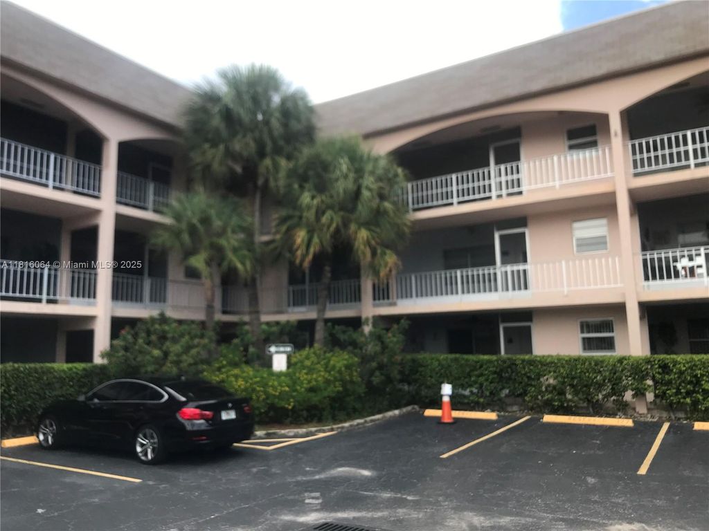 Photo of 501 Blue Heron Dr #110-A, Hallandale Beach, FL 33009 (MLS # A11816064)