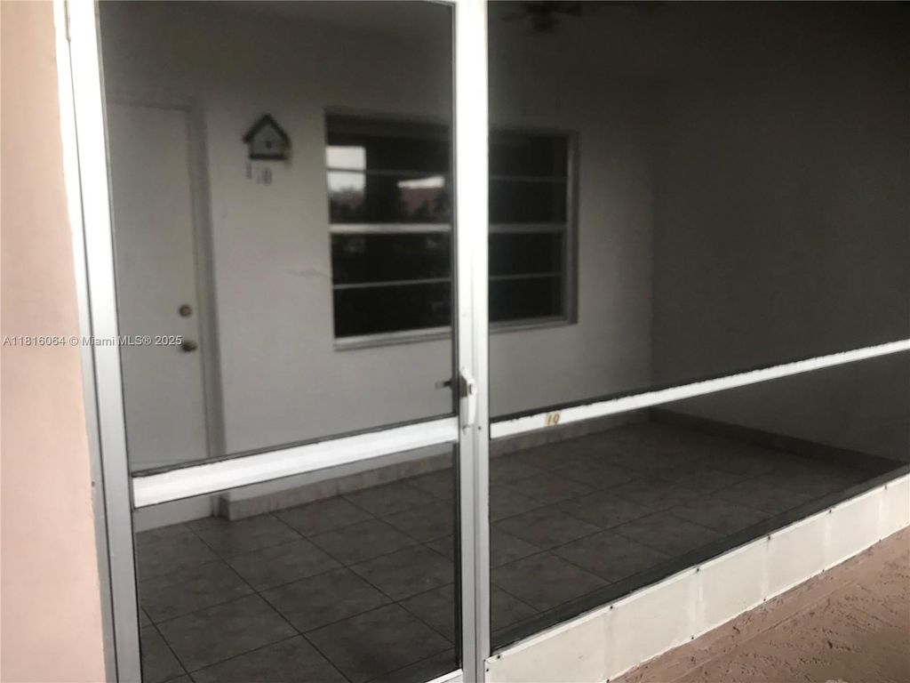 Photo of 501 Blue Heron Dr #110-A, Hallandale Beach, FL 33009 (MLS # A11816064)