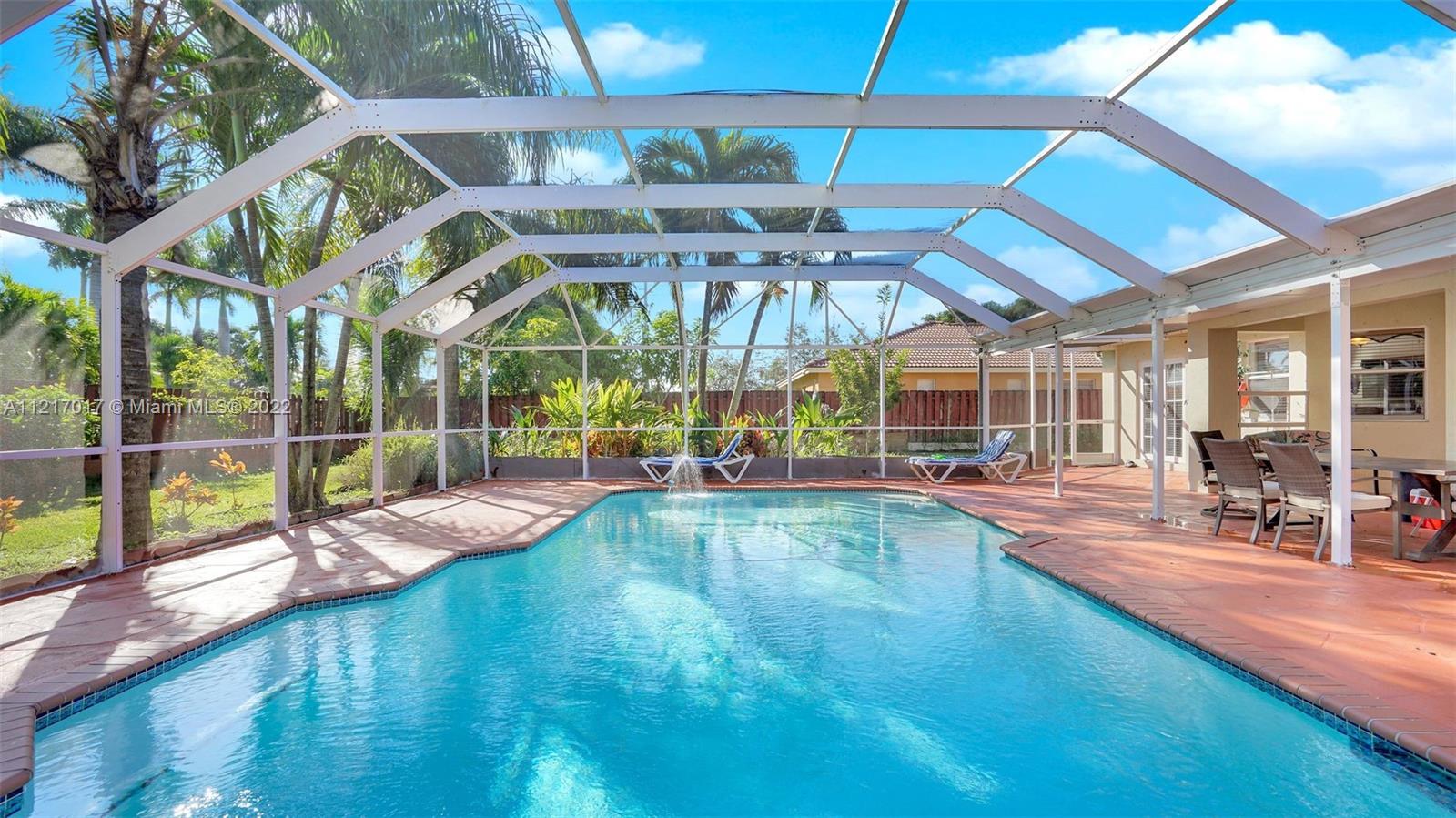 Beautiful 4 bedrooms 3 bath home with ample land to entertain family and friends. Perfect for your boat or RV. Tile throughout, 2 car garage, pool, large yard. NO CDD, low taxes. Easy to show! Call Sarai Granda