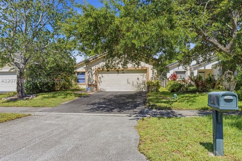 Photo of 3211 NW 123 Ave, Coral Springs, FL 33065 (MLS # A12071286)