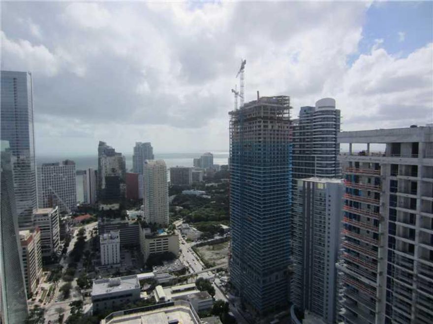 Beautiful corner lower PH unit, 3 bedrooms 3 baths with amazing views of skyline and bay. Crema marfil marble floors in living area and including a new bamboo floors in all bedrooms. Roller shades on all windows, Freshly painted in off white. New washer a nd dryer with more capacity - Best location in Brickell!