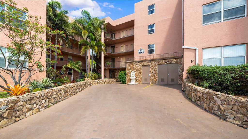 Photo of 2861 Somerset Dr #301, Lauderdale Lakes, FL 33311 (MLS # A11996834)