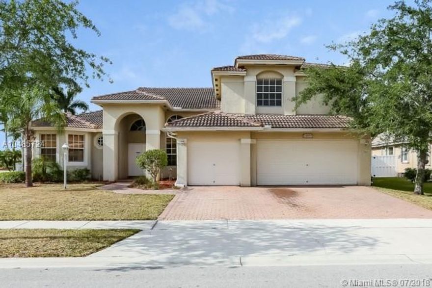 Immaculate 5 bedroom 3.5 bathroom home in lovely Gated community Pembroke Falls. Home has 3 car garage and sizable backyard. Open floor plan, large ceilings, over sized bedrooms. Community amenities include 24-hour manned security gate, clubhouse, fitness center, heated pool, kiddie pool, Jacuzzi, 8 tennis courts,basket ball courts, and walking trail. Close to Major highways, schools, and shopping. Don't miss out take a look today.