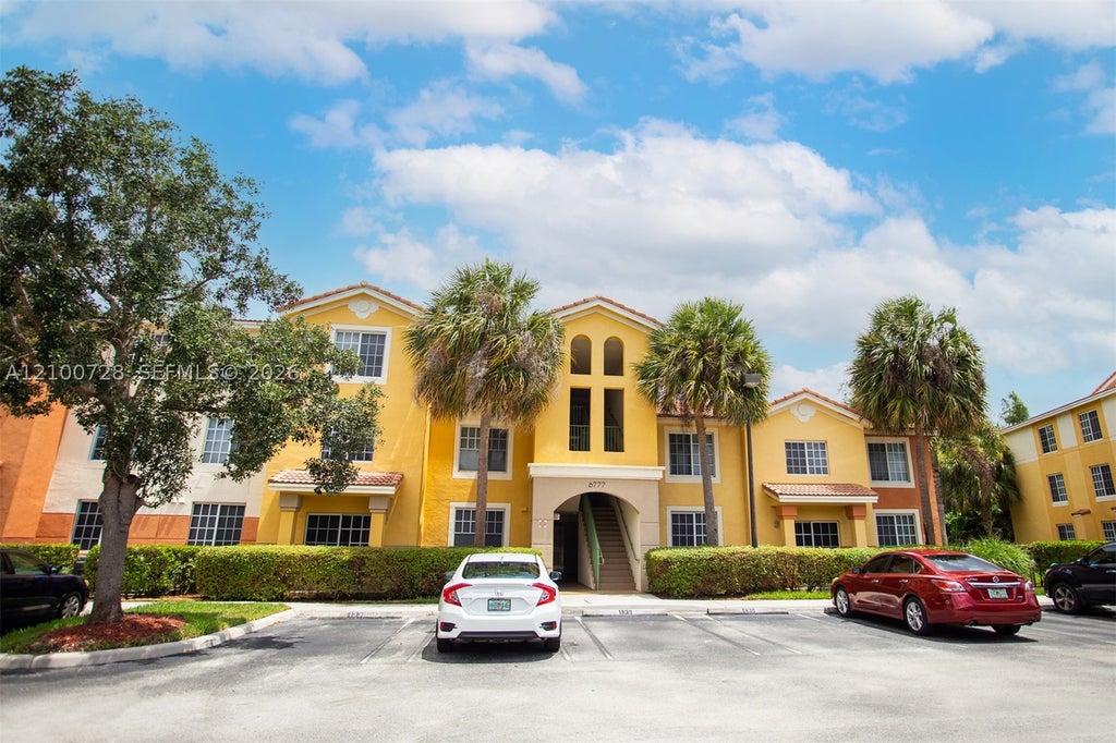 Photo of 6777 Heritage Grande #1206, Boynton Beach, FL 33437 (MLS # A12100728)