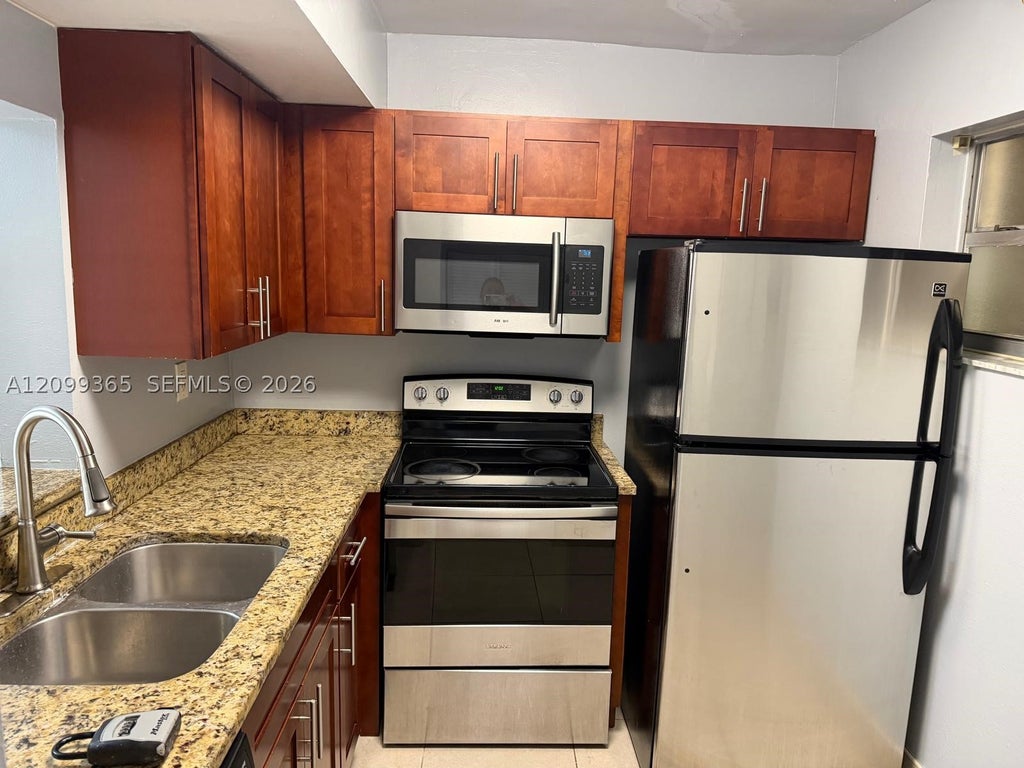 Photo of 3610 NW 21st St #304, Lauderdale Lakes, FL 33311 (MLS # A12099365)