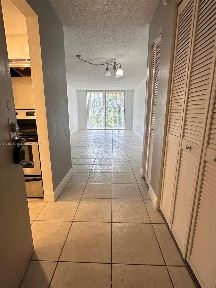Spacious 1 bed, 1 bath unit in desirable Bayview Palms! Located on the 5th floor, this residence features an open layout, large bedroom, ample closet space, and a private balcony with lush tree-top views. The kitchen includes updated appliances and plenty of cabinet storage. Community amenities include a pool, fitness center, clubhouse, and laundry facilities on each floor. Just minutes to Bal Harbour, FIU, Aventura, and the beach. One assigned parking space included. Well-maintained and move-in ready!