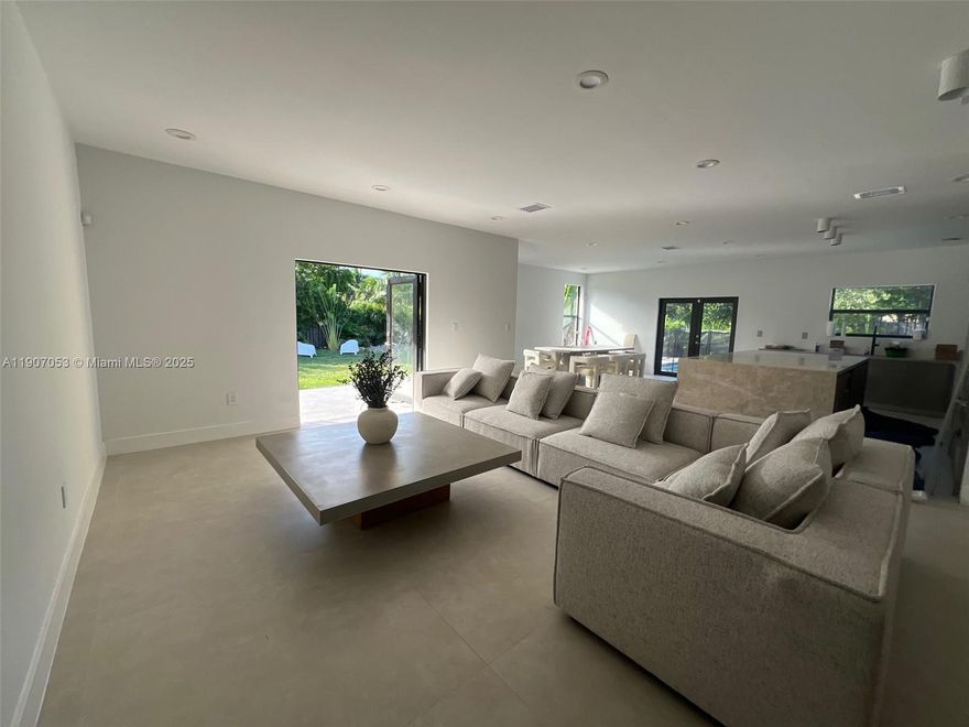 Located across from a golf course and surrounded by luxury estates and top-rated schools, this elegant residence is offered together with an adjacent lot, totaling over 14,000 sq ft. The property offers an expansive backyard with plenty of room to create any entertainment area you envision. Features include a grand Taj Mahal quartzite island, premium new appliances, and sophisticated designer furniture. Offered furnished or unfurnished, with all furnishings available for separate purchase. The property is also available for rent fully furnished at $14,000 per month.