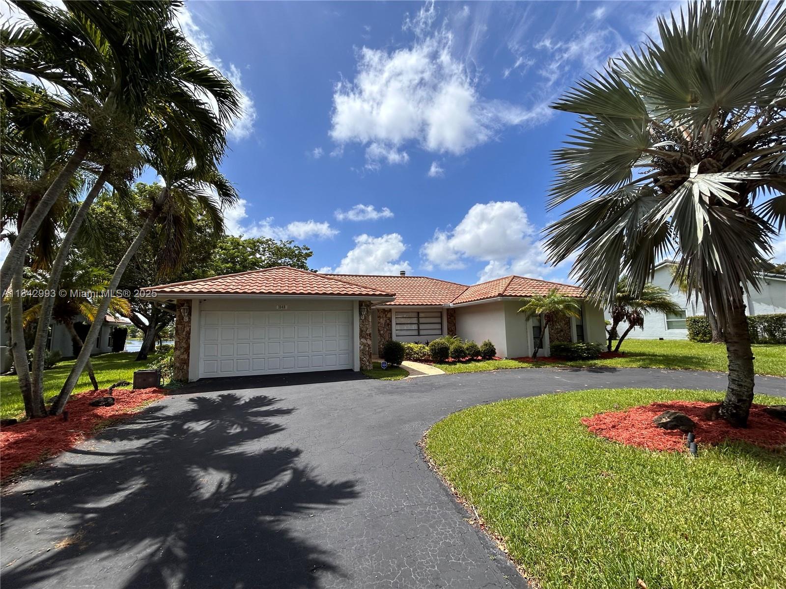 Lakefront 4BD 2BA home in one of Plantation’s most desirable areas. Open layout filled with natural light and panoramic water views. Spacious yard backs to the lake—perfect for relaxing or hosting. No HOA approval needed, first/last/security to move in. Minutes from Sawgrass Mills, top-rated schools, dining, and major roads. Enjoy a peaceful setting in a warm, welcoming community with all the convenience of city living.