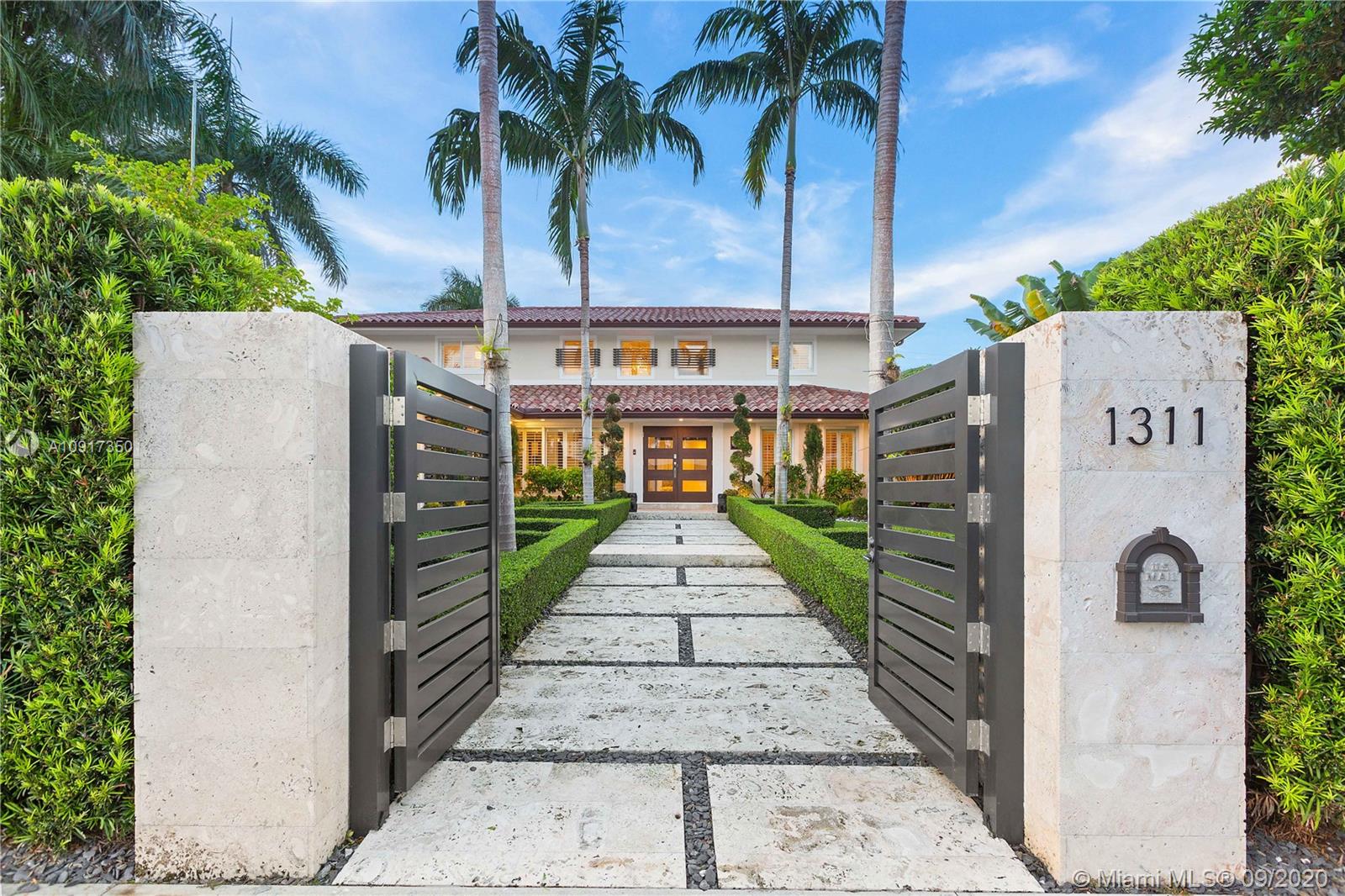 This home is truly spectacular. No expense was spared in remodeling this amazing 5-bedroom, 4.5-bath luxury home in Balharbor. Beautiful finishes throughout, rich hardwood, backlit Onyx, ceramic tiles and glass. Fabulous master suite with luxurious closet and dressing room, like in "Sex and The City," amazing bathroom with steam shower. Main bedrooms have en-suite bathrooms. Impact windows and doors, LED lighting, security cameras, and much more. Office, finished garage playroom, office with wet-bar, clear glass wine cellar, Miele appliances, built in coffee maker and gas stove. Laundry, pantry and maids room. Summer kitchen, salt water heated pool, sauna, outdoor shower, covered patio an mosquito misting system. All professionally fenced and landscaped. This home is a Work of Art.