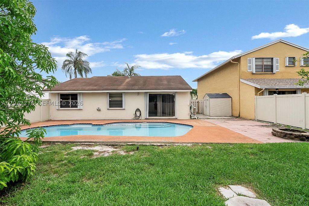 Photo of 681 Thornridge Ave, Davie, FL 33325 (MLS # A12042276)