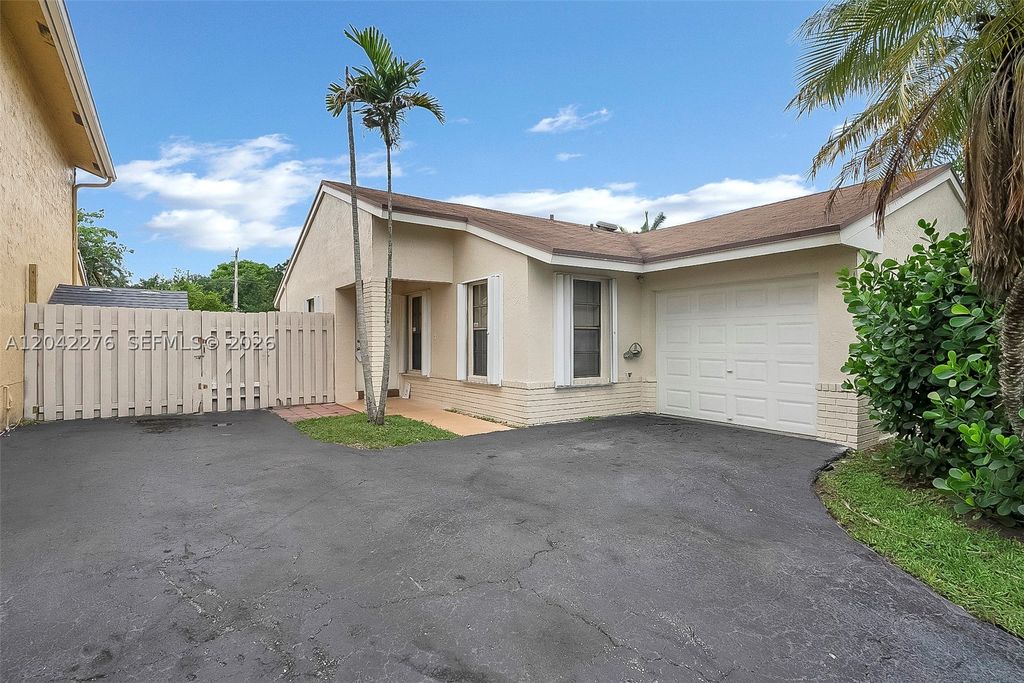 Photo of 681 Thornridge Ave, Davie, FL 33325 (MLS # A12042276)