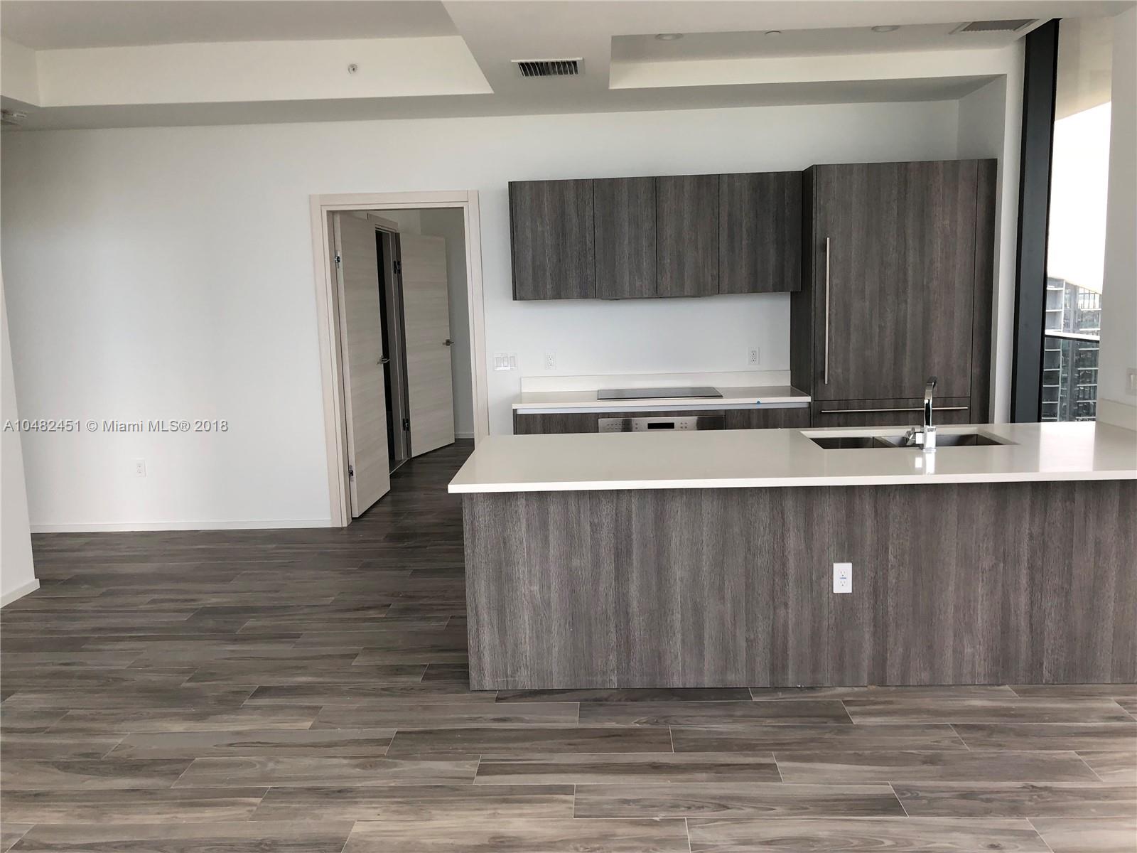 Brand new high floor 2Bed/2Bath corner unit with wrapped-around balcony facing bay and Miami skyline. Private elevator with biometrics technology. Subzero and Wolf appliances, wood-like porcelain floors, finished walk-in closet, large master bathroom with double sink, rain shower and separated tub. Incredible amenities include residential only roof top pool, residential only indoor lounge with private wine cellar, several lounge areas throughout the building, SPA with relaxing area and three treatment rooms, fully equipped gym, kids' room, full service pool and cabana lounge, pool and poker tables, tennis court, 24/7 concierge service.