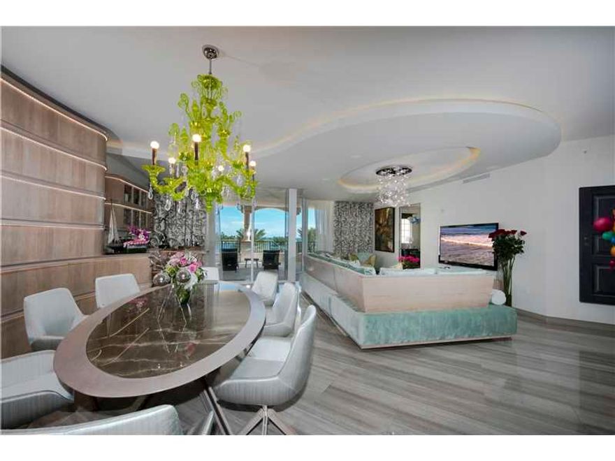 Watch the sunrise from this spectacular modern 3BR plus Den/3+1BA residence in Palazzo del Mare featuring 2 large balconies, spectacular views over the golf course, S. Beach, Govt. Cut & Ocean. Home boasts 3,500 SQFT. of luxury featuring beautiful marble  floors throughout, den/library, open flowing living room & dining area w/water views. Chef's kitchen w/custom cabinetry & counters, top appliances and large private eat-in dining area. Spacious master suite w/ glass rain shower/sunken Jacuzzi tub.