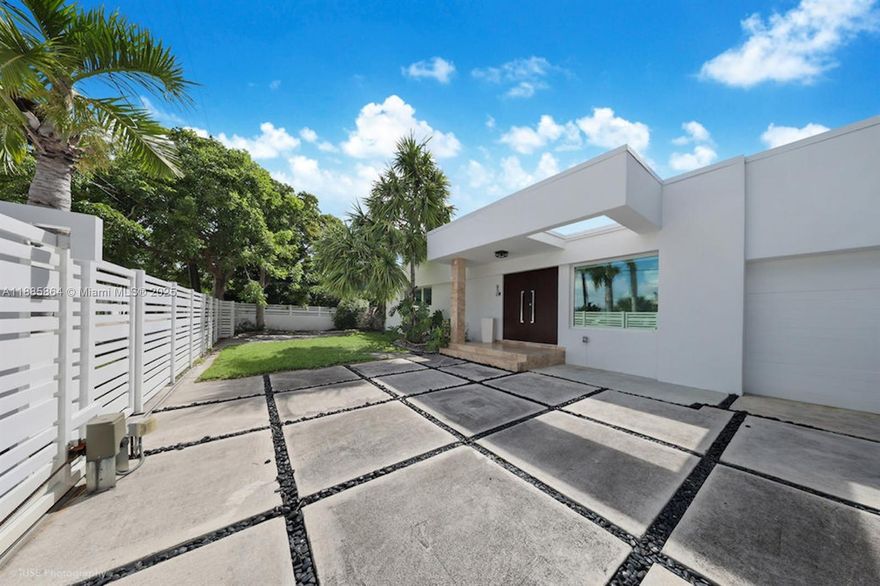 Charming Home in Venetian Islands. Experience elegant island living in this beautifully renovated 3-bedroom, 3.5-bath single house. This beautiful residence offers a perfect blend of sophistication and comfort, featuring spacious open social areas ideal for entertaining, a modern chef’s kitchen with new appliances, and abundant natural light throughout. Enjoy this jewel in one of Miami’s most sought-after neighborhoods — calm, private, and surrounded by the ocean’s gentle breeze. Savor the converted garage space in a family, bedroom game room space. Includes two convenient parking spaces , private pool  and Lawn and Pool maintenance. Electric Fence. Easy access to beaches, dining, and the vibrant energy of Miami Beach and Downtown.
