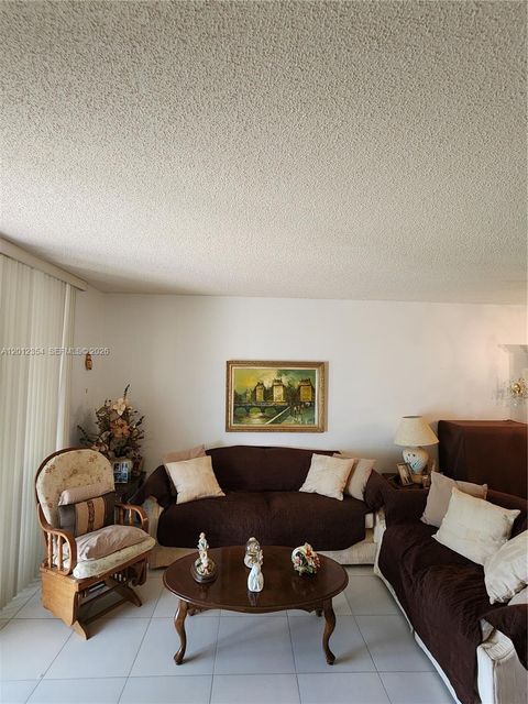 Tiny photo for 900 Colony Point Cir #107, Pembroke Pines, FL 33026 (MLS # A12012354)