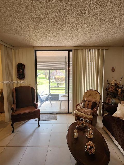 Tiny photo for 900 Colony Point Cir #107, Pembroke Pines, FL 33026 (MLS # A12012354)
