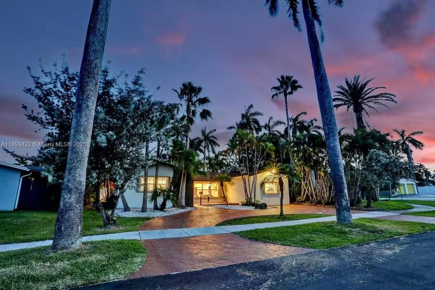 Welcome to your tropical retreat just minutes from Hollywood Beach. This bright and spacious 4-bedroom, 3-bath home features an open layout with modern updates, including an upgraded kitchen, stylish bathrooms, and sun-filled living areas perfect for relaxing or entertaining. Step outside to a lush backyard with a sparkling pool surrounded by tropical landscaping. Enjoy the convenience of a large circular driveway and an unbeatable location close to shops, dining, and the Hollywood Broadwalk. This beautifully maintained home offers comfort, elegance, and the best of coastal living.