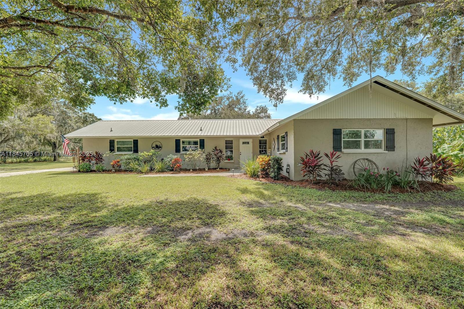 Tucked away on a scenic 5-acre parcel, this charming 3-bed, 2-bath home offers a rare opportunity to enjoy peaceful country living with all the conveniences of nearby amenities. The property features a spacious open porch—perfect for relaxing and taking in the tranquil surroundings. Inside, the home provides a functional layout with comfortable living spaces, ideal for both everyday living and weekend retreats. The land is mostly cleared yet beautifully shaded by mature oak trees, offering the perfect blend of open pasture and natural canopy. Fully fenced and cross-fenced, it's well-suited for horses, livestock, or simply enjoying wide-open green space. With plenty of room to expand, build a barn or plant a garden, this property is a dream for those seeking space and self-sufficiency.