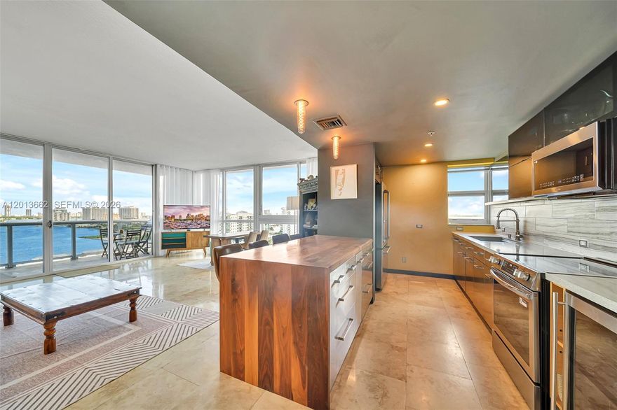 Rare high-floor 3-bedroom corner unit with sweeping water views. This residence offers 3 bedrooms, 2.5 bathrooms, and a versatile den ideal for an office or playroom. Widely regarded as the best line in the building, it features floor-to-ceiling windows with panoramic East, South, and West exposures overlooking Biscayne Bay and the downtown skyline. Recent upgrades include a designer kitchen and modern bathrooms. The primary suite offers a large walk-in closet and spa-like bath, while two generous guest bedrooms also enjoy water views. Large open balcony facing Miami Beach and the ocean. Amenities include a rooftop pool, gym, sauna, and BBQ area. Two assigned garage spaces. Located in North Bay Village, a hidden-gem island between Miami Beach and Miami with exciting new luxury developments underway.