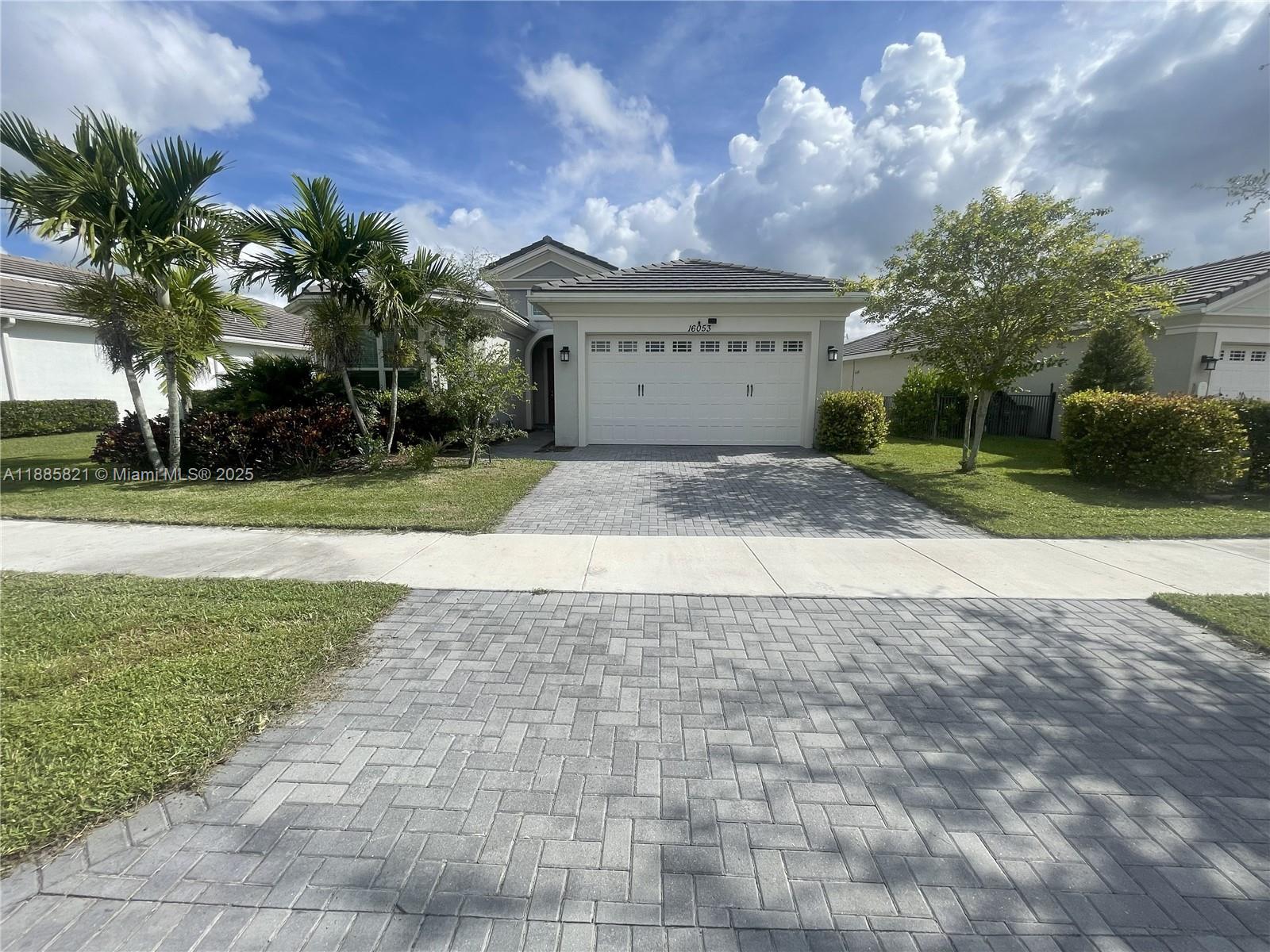 Beautiful 3 bedroom, 2.5 bath home with a den in The Hammocks at Westlake. Built in 2019, this home features new bedroom flooring (2022), a new dishwasher (2023), a bright open layout, and smart home upgrades including a smart thermostat. The den includes a door and can easily serve as an extra bedroom, office, or versatile flex space.
Additional highlights include impact windows and doors, a 2-car garage with insulation panels to reduce heat, two overhead storage racks, and a pull-down attic ladder. Residents enjoy access to Westlake’s resort-style amenities, including a lagoon pool, splash pad, playgrounds, and event lawn.
Located near the community’s main entrance, The Hammocks offers both convenience and a peaceful neighborhood feel. Move-in ready and waiting for its next owner!
