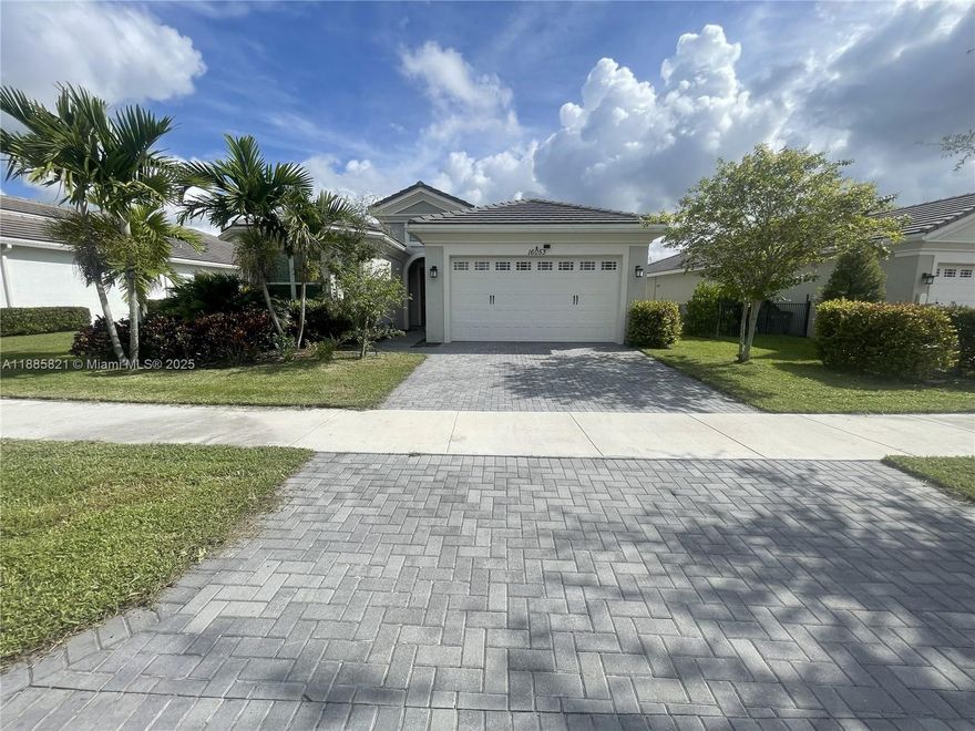 Beautiful 3 bedroom, 2.5 bath home with a den in The Hammocks at Westlake. Built in 2019, this home features new bedroom flooring (2022), a new dishwasher (2023), a bright open layout, and smart home upgrades including a smart thermostat. The den includes a door and can easily serve as an extra bedroom, office, or versatile flex space.

Additional highlights include impact windows and doors, a 2-car garage with insulation panels to reduce heat, two overhead storage racks, and a pull-down attic ladder. Residents enjoy access to Westlake’s resort-style amenities, including a lagoon pool, splash pad, playgrounds, and event lawn.

Located near the community’s main entrance, The Hammocks offers both convenience and a peaceful neighborhood feel. Move-in ready and waiting for its next owner!