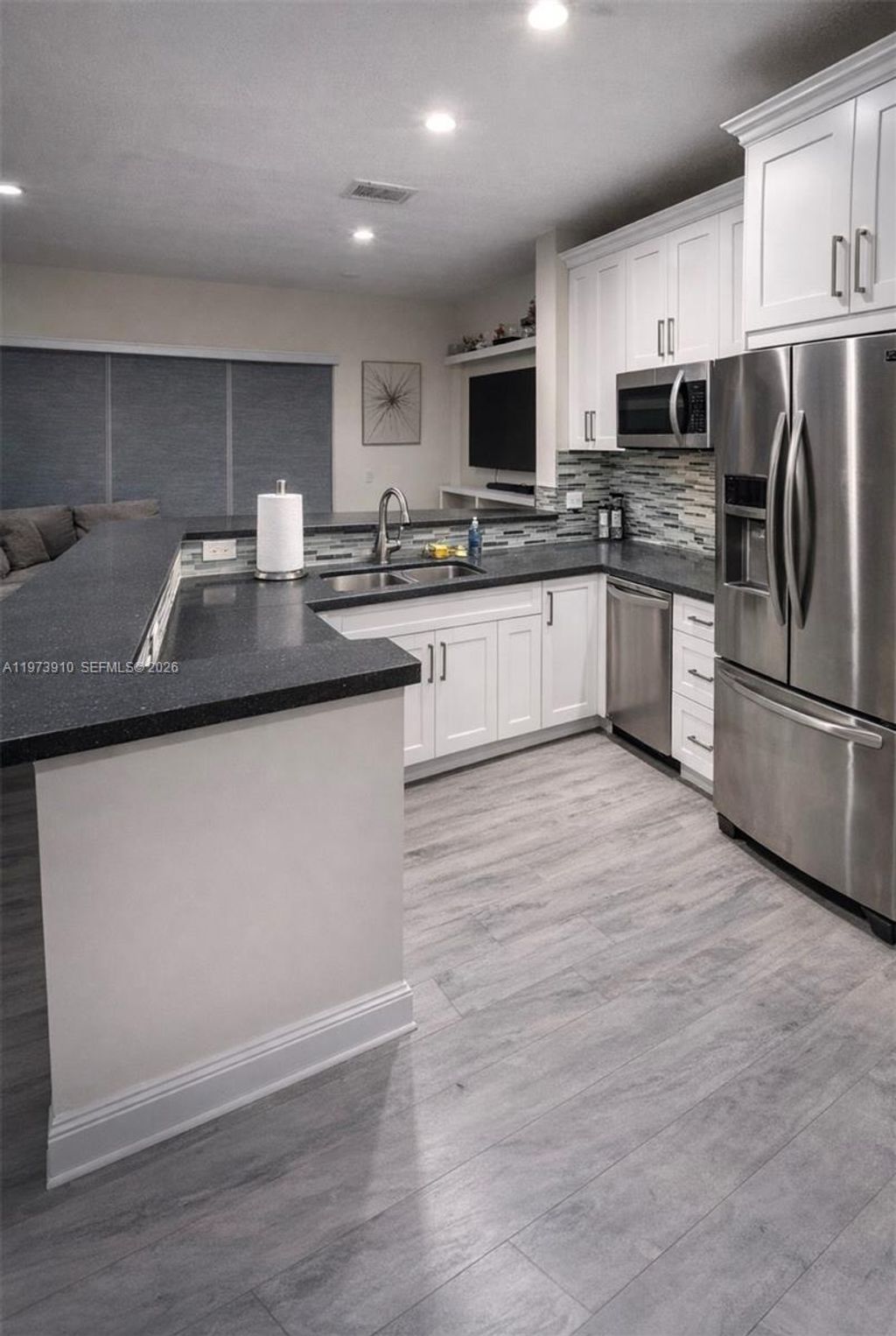 Photo of 12140 SW 4th St, Pembroke Pines, FL 33025 (MLS # A11973910)