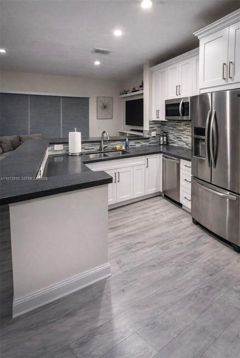 Photo of 12140 SW 4th St, Pembroke Pines, FL 33025 (MLS # A11973910)