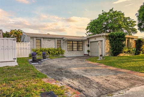 Photo of 8580 NW 20th Ct, Sunrise, FL 33322 (MLS # A12037087)