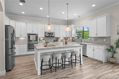 Photo of 8142 Bradford Way, Parkland, FL 33076 (MLS # A12084752)