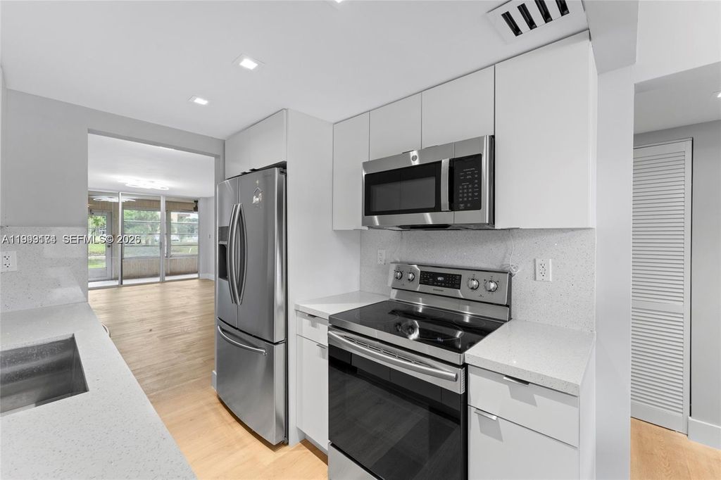 Photo of 3141 NW 47th Ter #121, Lauderdale Lakes, FL 33319 (MLS # A11999174)