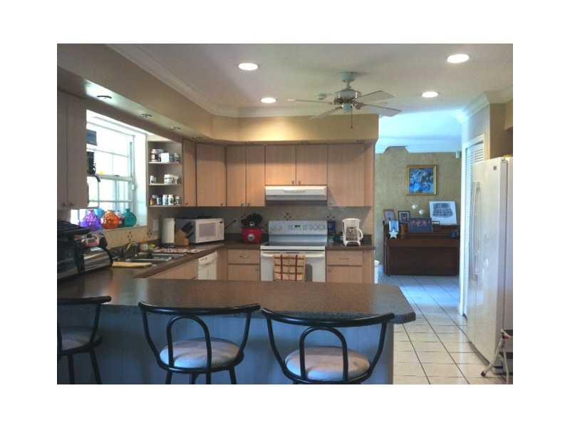 GREAT HOME IN NORTH CUTLER BAY. 4 BEDROOMS PLUS DEN, FORMAL LIVING ROOM WITH SKYLIGHTS, LARGE MASTER BEDROOM WITH WALK- IN CLOSET, SPACIOUS KITCHEN- FAMILY ROOM AREA, SLIDING GLASS DOORS OPEN TO PRIVATE TERRACE, TILE & LAMMINATED WOOD FLOORS. THROUGHOUT. LARGE UTILITY. SHED FOR CONVENIENCE. CIRCULAR DRIVEWAY, A-RATED WHISPERINE PINES ELEMENTARY SCHOOL. CLOSE TO POPULAR BLACK POINT MARINA. 24 HOUR NOTICE. DO NOT DISTURB TENANTS. CALL LA.