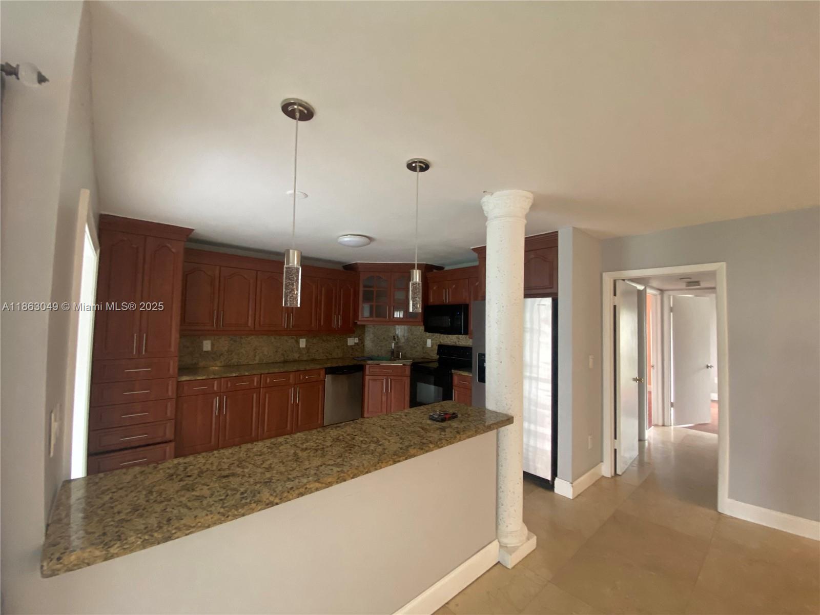 Discover this beautifully spacious 3-bedroom, 2-bathroom condo conveniently located on the first floor. The large kitchen boasts granite countertops and plenty of cabinetry, perfect for all your culinary adventures. This home is in a gated community, providing security and a family-friendly atmosphere. Its prime location offers easy access to all essentials. Don't miss out on this incredible opportunity to make this your new home! ONLY 2 PARKING SPACES AND ONLY 1 PET ALLOWED UNDER 30 LBS.