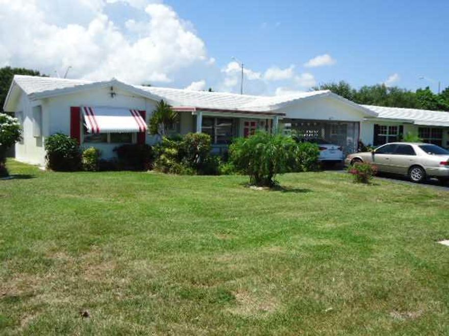 Immaculately maintained single family home in 55+ development with lovely private yard. No Land Lease. New Eat-In Kitchen with granite countertops, all tile throughout living areas, brand new carpet in bedrooms only. Walk in closet. Huge bedrooms and Two  full baths. Newer A/C. Carport and a very long driveway. Shows great and ready to move in. Easy to show click on Showing Assist.