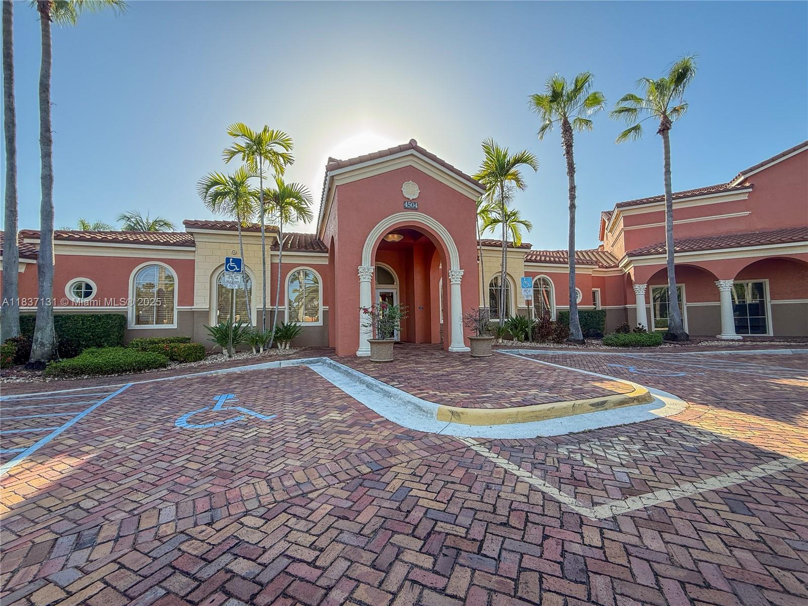 Resort-style living in this well-maintained 2-bed, 1-bath first-floor condo in gated Villaggio at Miramar. Features an open layout with high ceilings, a practical kitchen with pantry and breakfast counter, plus in-unit washer and dryer. Spacious bedrooms with natural light. Community amenities include a lagoon-style pool, fitness center, indoor basketball court, clubhouse, walking paths, and playground. Prime location west of I-75 near shopping, dining, and top schools. Move-in ready—ideal as a primary home or investment!